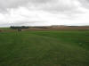 The characteristic mound and ditch of the henge